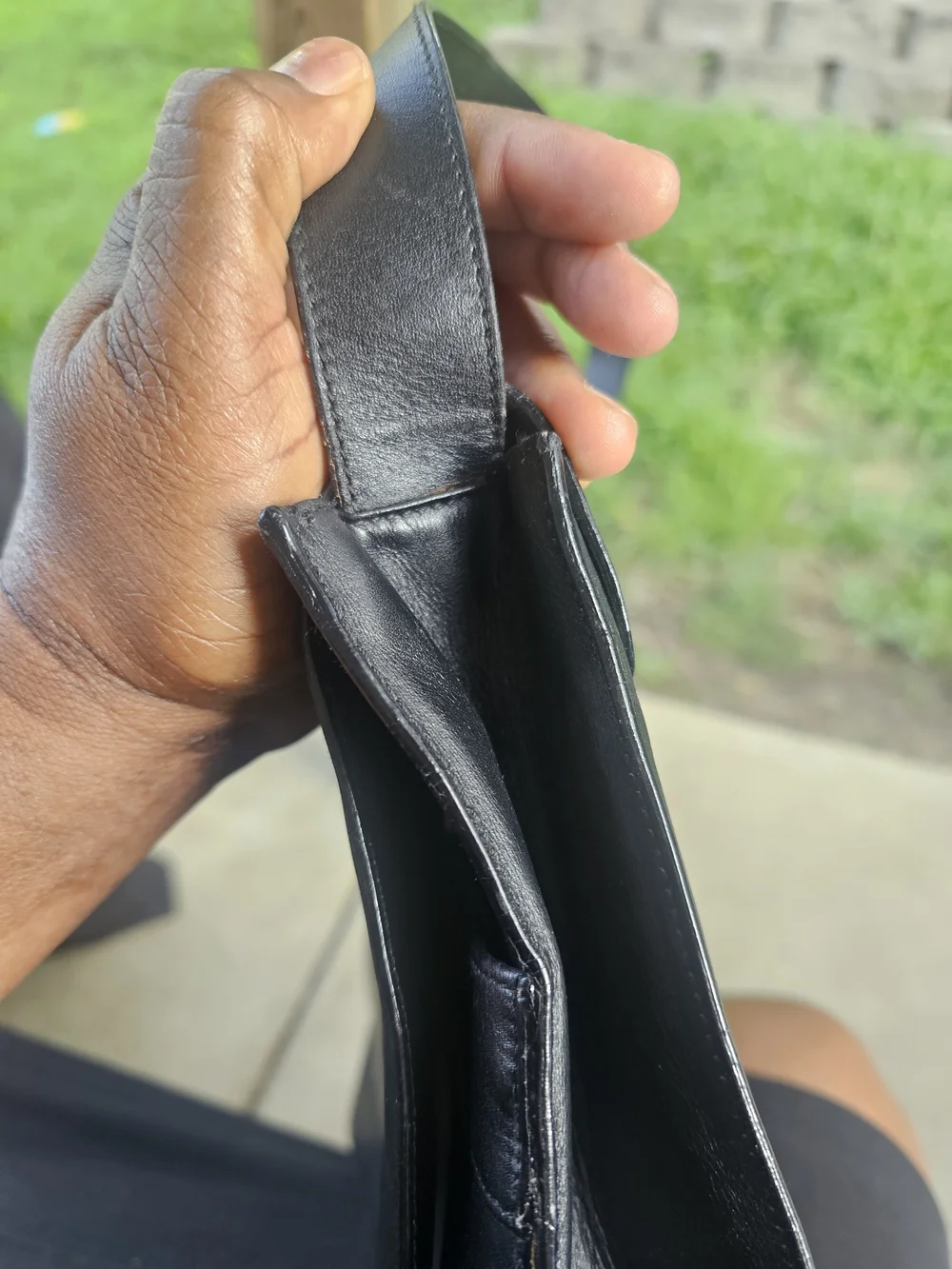 Black Leather Shoulder Bag with Gold Accent
